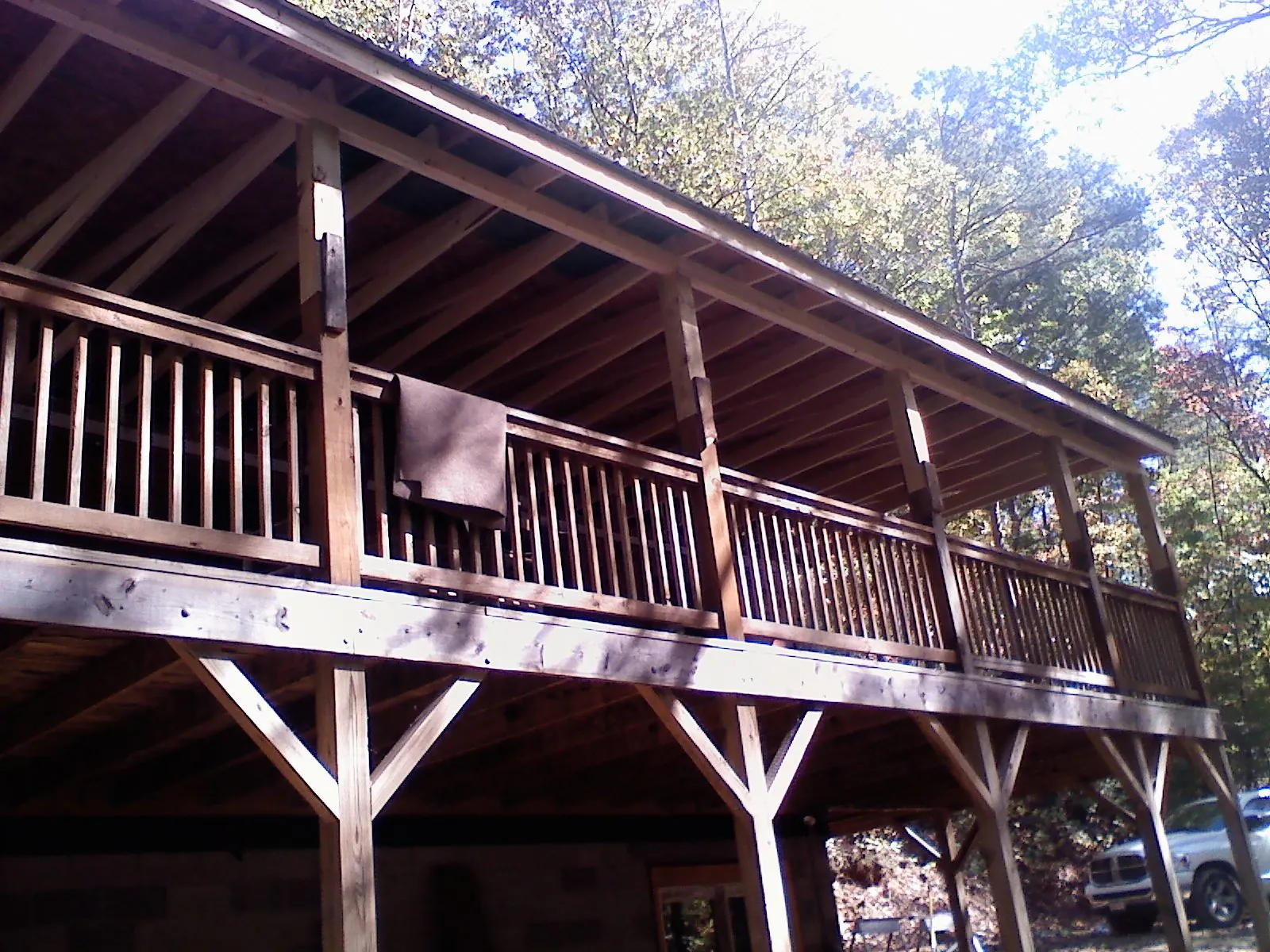 Timber framing under a new elevated porch and deck — Roof Leak Repair in Summit Argo by Roofing Brothers